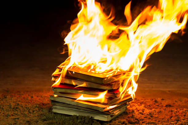 Stack of books burning Stack of books burning book burning photos stock pictures, royalty-free photos & images