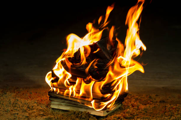 Stack of books burning Stack of books burning book burning stock pictures, royalty-free photos & images