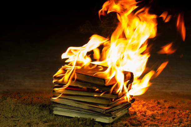 Stack of books burning Stack of books burning book burning stock pictures, royalty-free photos & images
