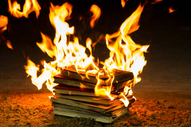 Stack of books burning Stack of books burning book burning stock pictures, royalty-free photos & images