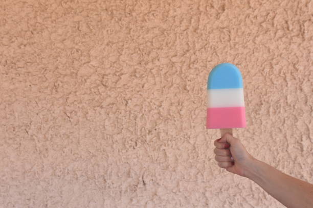 istock Bath sponge in the form of popsicle  against the wall 1035603130