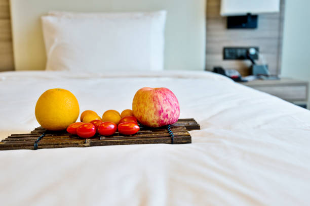 istock Fruits on bed in hotel room 1035603784