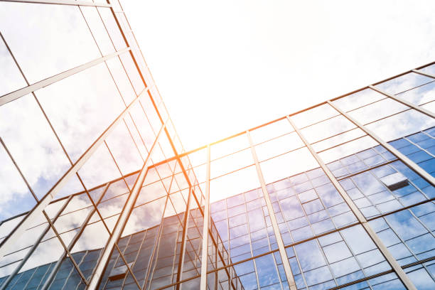 istock Office building wall reflecting the cloud sky 1035609118