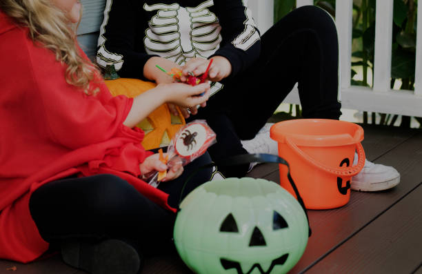 istock Little children trick or treating on Halloween 1035611826