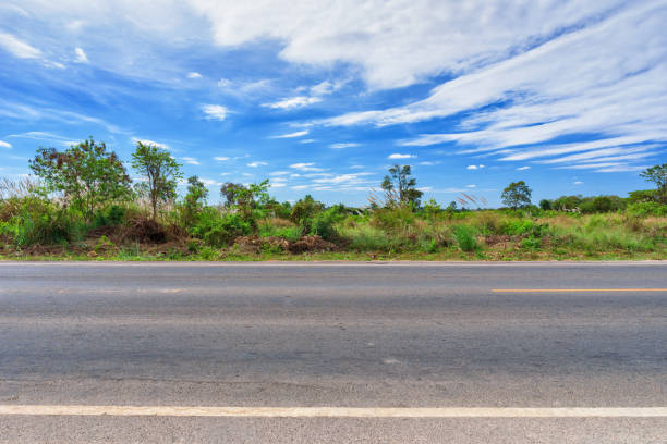 istock Asphalt road side view and landscape countryside. 1035613070