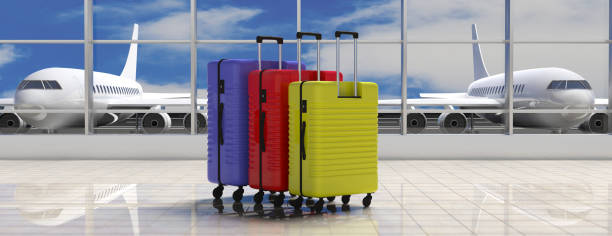 istock Three bright colors suitcases on airport terminal background, banner. 3d illustration 1035632084