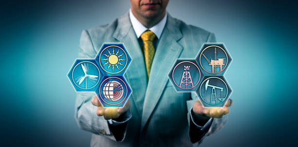 istock Manager Comparing Fossil And Renewable Energy 1035635354