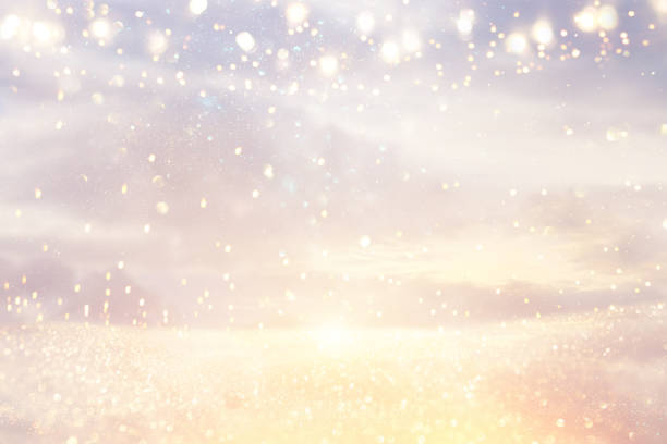 istock glitter vintage lights background. silver, blue, purple and gold. de-focused. 1035636008