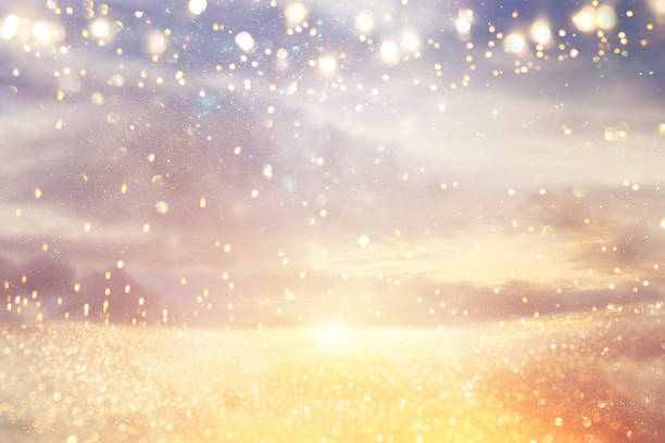 istock glitter vintage lights background. silver, blue, purple and gold. de-focused. 1035636016