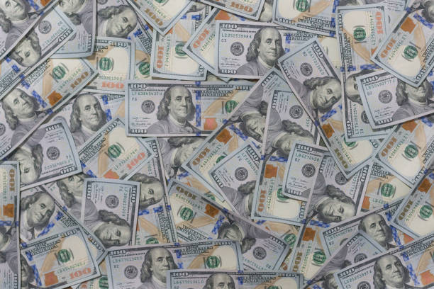 istock Background of one hundred dollar bills 1035642844