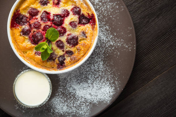istock Sweet pie or casserole with cherry and green mint 1035646578