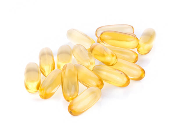 istock Fish oil pill on white background 1035647394