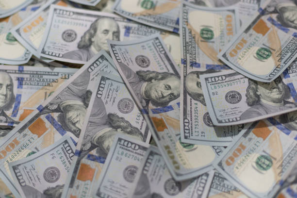 istock Background of one hundred dollar bills 1035647604