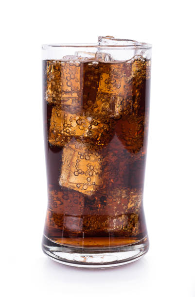 istock Cola in glass with ice cubes on white background 1035650030