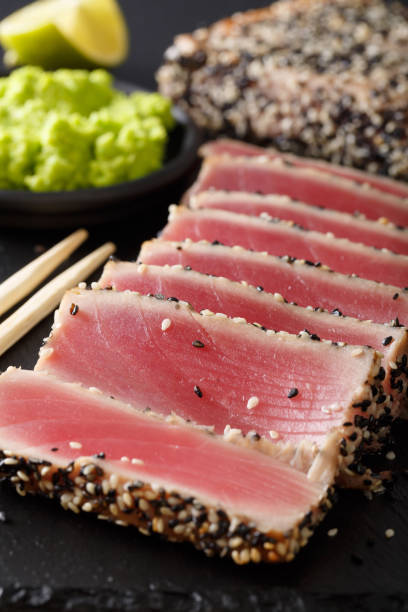 istock Seared ahi tuna coated sesame seeds with wasabi macro. Vertical 1035653670