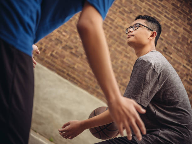 istock Twins at basketball 1035658884
