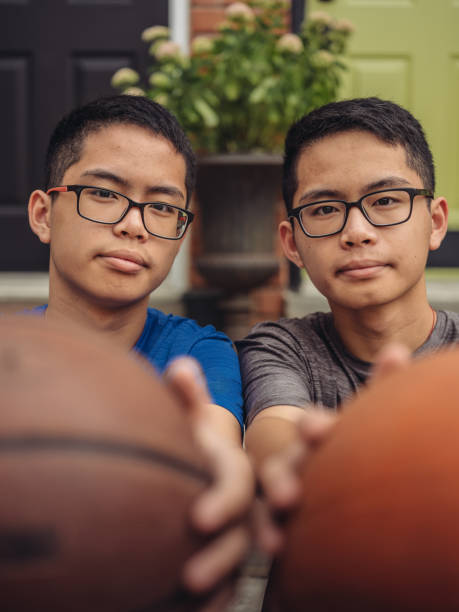 istock Twins at basketball 1035659012