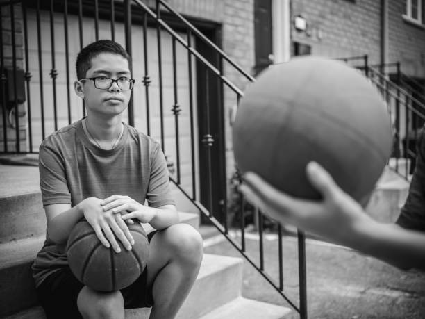 istock Twins at basketball 1035659138