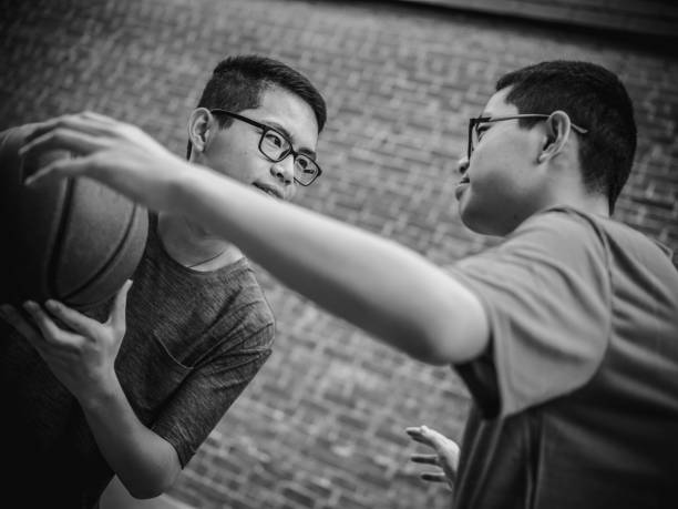 istock Twins at basketball 1035659188