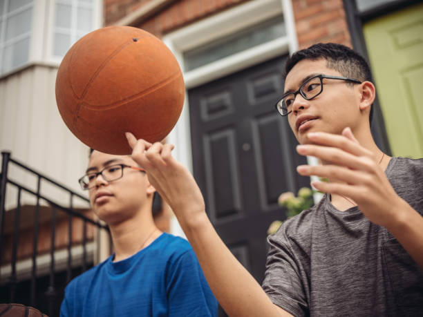 istock Twins at basketball 1035659262