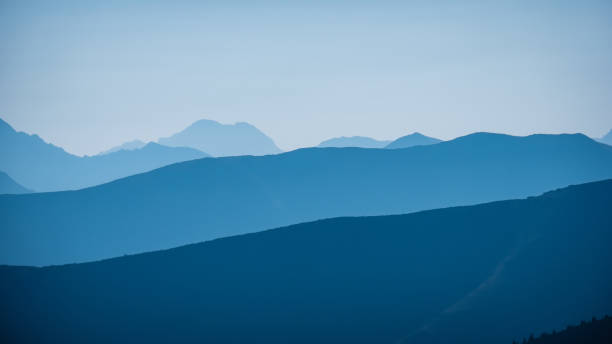 istock mountain top panorama in  autumn covered in mist or clouds 1035659330