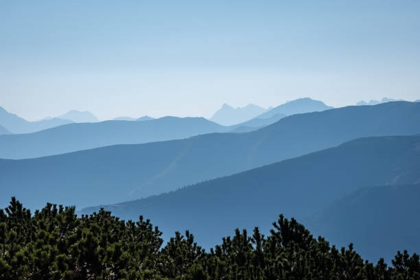 istock mountain top panorama in  autumn covered in mist or clouds 1035659388