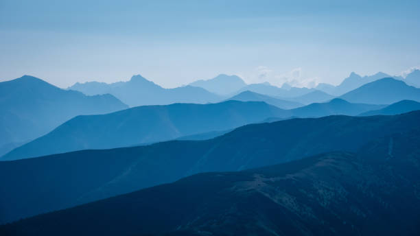 istock mountain top panorama in  autumn covered in mist or clouds 1035659498