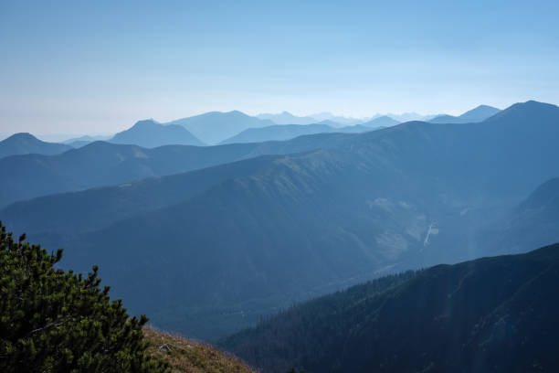 istock mountain top panorama in  autumn covered in mist or clouds 1035659578