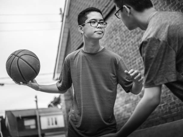istock Twins at basketball 1035659882
