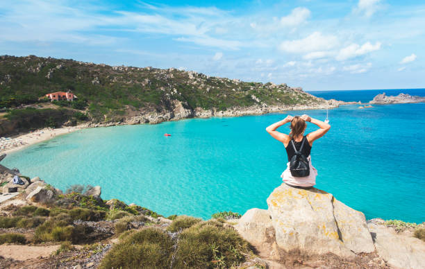 istock Woman enjoying Sardinia 1035662258