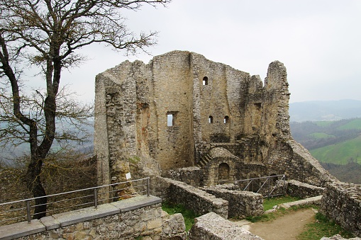 Canossa castle, Italy - April 11, 2018: Ruins of the famed Canossa castle, where emperor Henry IV met pope Gregor VII in 1077.  Region Emilia-Romagna, Italy, Europe.