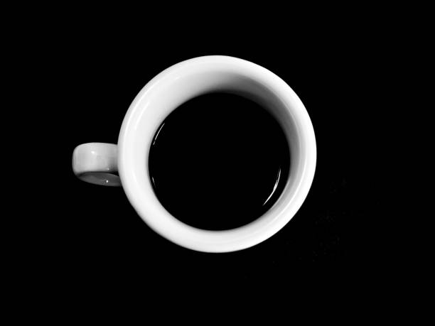 Black coffee in white cup on background