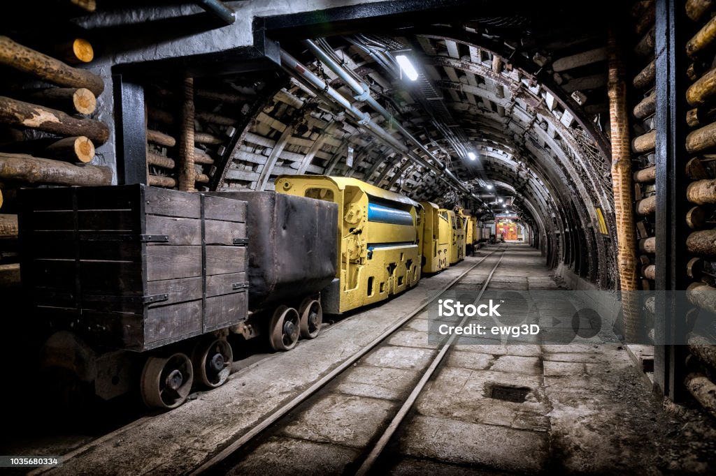 Coal mine underground corridor with freight railroad cars Coal mine underground corridor with freight railroad cars, Makoszowy coal mine in Zabrze, Poland Mining - Natural Resources Stock Photo