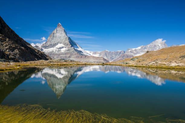 istock Matterhorn reflected in Riffelsee Lake 1035682882