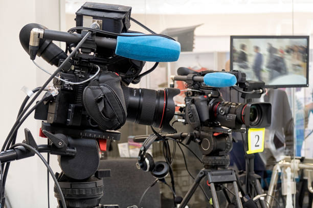 istock Professional tv camera in live show pavilion. 1035688078