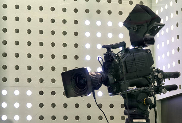 istock Professional tv camera in live show pavilion. 1035688156