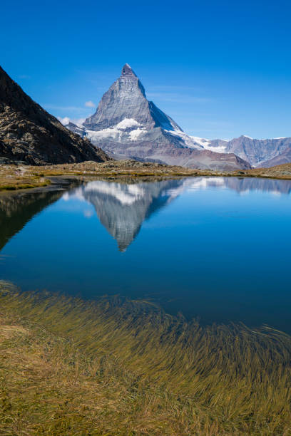 istock Matterhorn reflected in Riffelsee Lake 1035688252