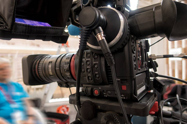 istock Professional tv camera in live show pavilion. 1035688298