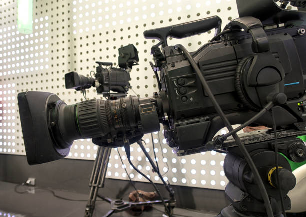 istock Professional tv camera in live show pavilion. 1035688348