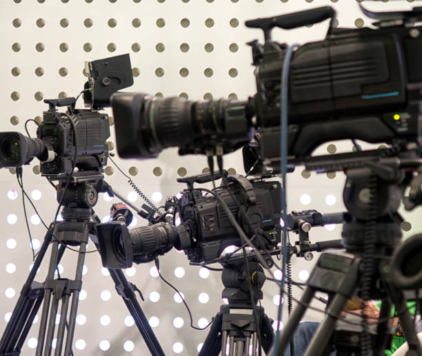 istock Professional tv camera in live show pavilion. 1035688692