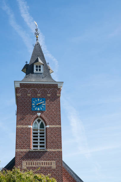 istock tower of church in Eijsden, The Netherlands 1035689078