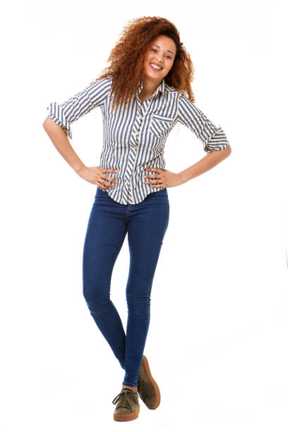 istock confident woman standing against isolated white background 1035693088