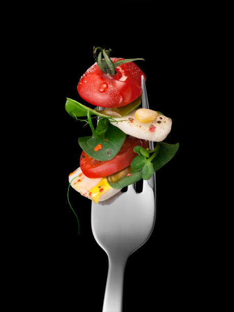 istock Salad Caprese and its ingredients strung on a fork 1035696420