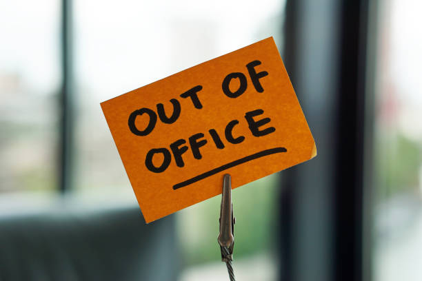 Out of office written stock photo