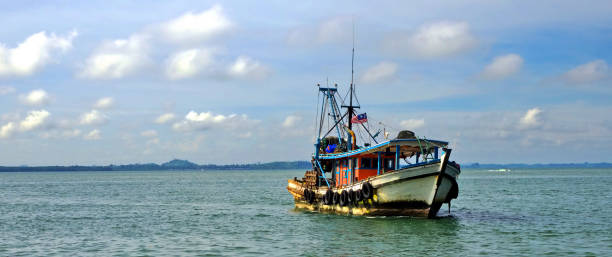 Malaysian boat Malaysian boat penyu kuala stock pictures, royalty-free photos & images