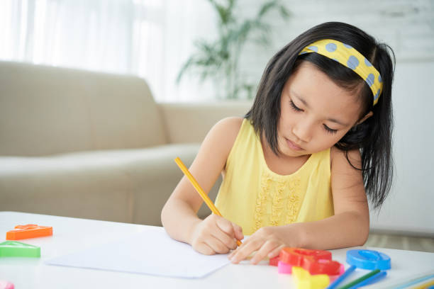 istock Girl enjoying drawing 1035719294