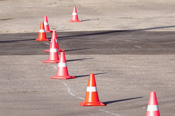 istock Traffic cone tipped over on pavement 1035719770