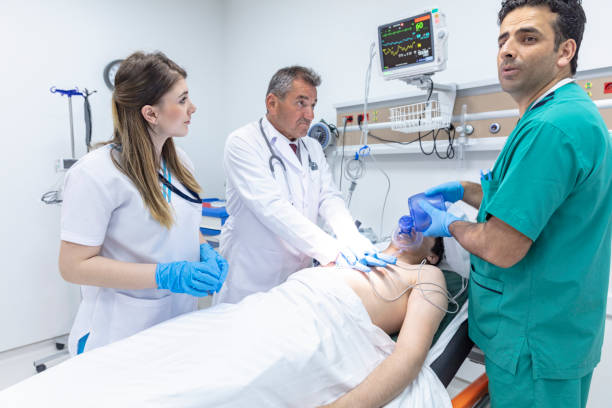 istock Doctors in emergency room working on unconscious patient 1035721294