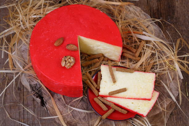istock Still life with cheese, honey and nuts on a wooden table 1035725040