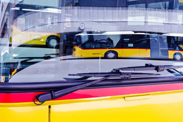 Reflection in the windshield of a Postbus, coach, coach at the train station, Bern, Switzerland